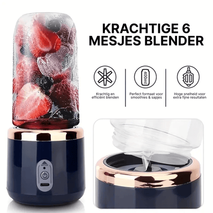JuiceMate Go blender met bevroren bessen en ijs in transparante kan, met detail van 6-mesjes motorbasis.