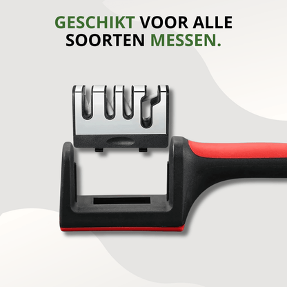 Knivix 4-in-1 messenslijper met afneembare slijpunit en zichtbaar handvat in zwart-rode uitvoering, gefotografeerd van bovenaf.